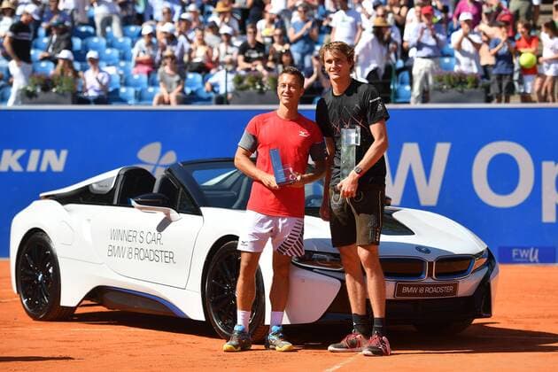 Alexander ZVEREV GER in lederhosen and with the winners cup and his opponent Philipp KOHLSCHREIBER pose in front of the special prize of a BMW i8 Roadster Cup Trophée award ceremony FINALE Tennis BMW Open 2018 at 06 05 2018 in Muenchen