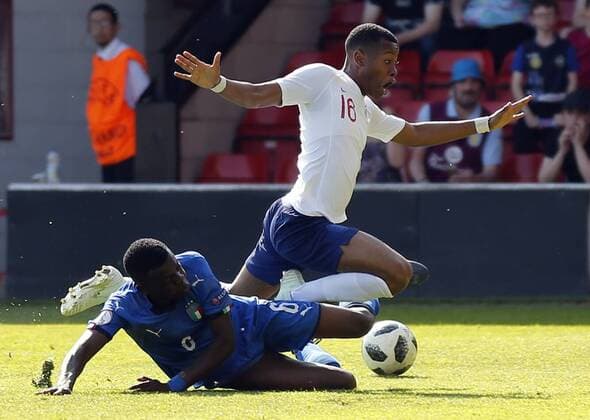 England v Italy International Friendly L?nderspiel Rayhaan Tulloch (r) of England is fouled by Paolo Gozzi Iweru of Italy to give away a penalty during the International Friendly match at Wembley Stadium, London Content Not Available For UK Newspapers Copyright: xSimonxDaelx FIL-11557-0115