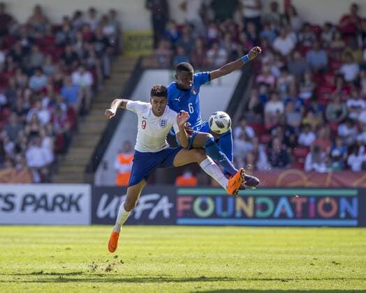 7th May, Bankss Stadium, Walsall, England; UEFA Under 17 European Championships, England U17s versus Italy U17s; Paolo Gozzi Iweru of Italy wins the ball from Tyreece John Jules of England  ActionPlus12021753