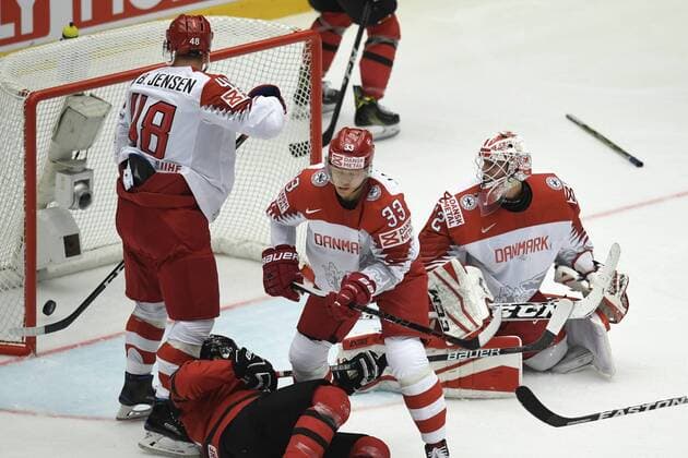 Denmarks Nicholas B. Jensen, left, Julian Jakobsen, center, and goalkeeper FrederikAndersen react as Canada s Josh Bailey have scored the first goal in the IIHF World Championship WM Weltmeisterschaft Group B Ice hockey Eishockey match between Canada and Denmark in Jyske Bank Boxen Arena in Herning, Denmark, Monday, May 7, 2018. Foto: Lars Moeller Ritzau Scanpix 2018 , Herning Denmark  Copyright: LarsxMoellerx cop102 spdk20180507-203414-L