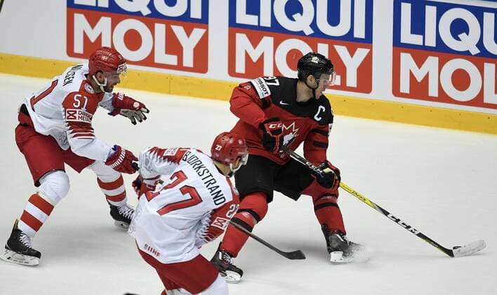 Frans Nielsen and Oliver Björkstrand of Denmark in action against Connor McDavid of Canada during IIHF World Championship WM Weltmeisterschaft group B Ice hockey Eishockey match between Canada and Denmark in Jyske Bank Boxen in Herning, Denmark, Monday, May 7, 2018. , Herning Denmark  Copyright: LarsxMoellerx xRitzauxScanpix LarsxMoellerx cop102 spdk20180507-210530-L