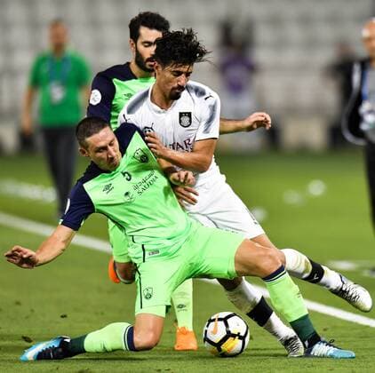 (180508) -- DOHA, May 8, 2018 -- Baghdad Bounedjah (R) of Al Sadd SC vies with Mark Milligan of Al Ahli Saudi during the round of 16 in the AFC Asian Champions League football match at the Jassim Bin Hamad Stadium, in Doha, capital of Qatar, May 7, 2018. Al Sadd SC won 2-1. ) (SP)QATAR-DOHA-SOCCER-AFC CHAMPIONS LEAGUE-AL SADD VS AL AHLI SAUDI Nikku 