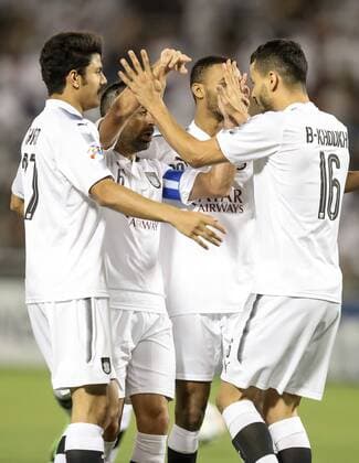 (180508) -- DOHA, May 8, 2018 -- Boualem Khoukhi (R) of Al Sadd SC celebrates a goal with his teammates during the round of 16 in the AFC Asian Champions League football match against Al Ahli Saudi at the Jassim Bin Hamad Stadium, in Doha, capital of Qatar, May 7, 2018. Al Sadd SC won 2-1. ) (SP)QATAR-DOHA-SOCCER-AFC CHAMPIONS LEAGUE-AL SADD VS AL AHLI SAUDI Nikku 