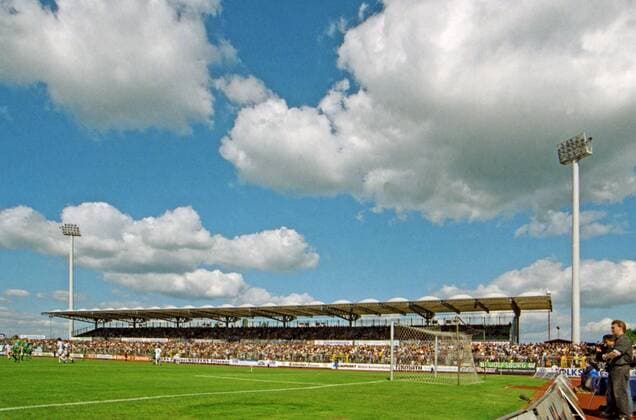 From 2 BL season 1996 97 VfL Wolfsburg WOB against FC Carl Zeiss Jena 4 1 on 24 05 1997 in the VfL WOB Stadium on the Elsterweg In the picture The VfL East Stand with floodlight masts