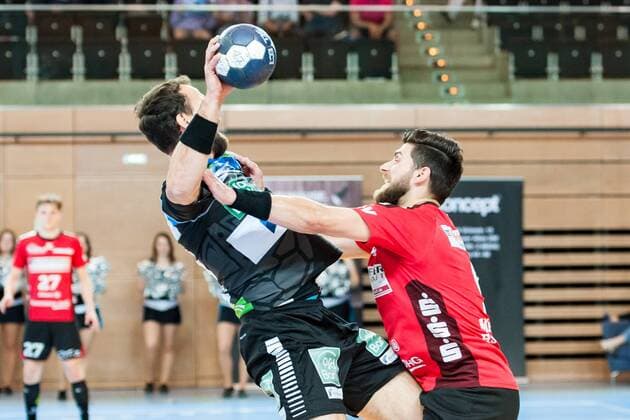 The attack by Daniel Pankofer Nr 19 Vikings was stopped here by Pavel Mickal Nr 9 Nordhorn HC Rhein Vikings vs HSG Nordhorn Lingen Handball 2 Bundesliga 12 05 18 Düsseldorf NRW Germany Castello Copyright: xcdn_nszx