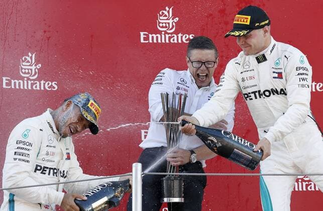 British Formula One pilot Lewis Hamilton, of Mercedes, next to teammate, Finnish Valtteri Bottas (R, second), and team s engineer Peter Bonnington (C), celebrates his victory at the Formula One Grand Prix of Spain at Circuit Barcelona-Catalunya race-track in Montmelo, Barcelona, northeastern Spain, 13 May 2018. Grand Prix of Spain !ACHTUNG: NUR REDAKTIONELLE NUTZUNG!  Copyright: xAndreuxDalmaux GRAF6607 20180513-636618318453551927