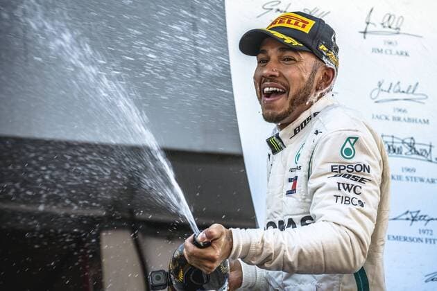 Themen der Woche - SPORT Bilder des Tages - SPORT May 13, 2018 - Barcelona, Catalonia, Spain - LEWIS HAMILTON (GBR) of Mercedes sprays with champagne as he celebrates his victory of the Spanish GP holding his cup on the podium at the Circuit de Barcelona - Catalunya F1 2018: Spanish Grand Prix: Hamilton Wins - ZUMAo105 20180513_zap_o105_011 Copyright: xMatthiasxOesterlex