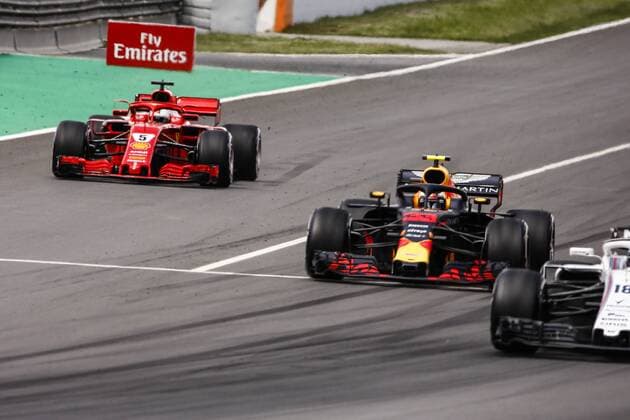 May 13, 2018 - Barcelona, Catalonia, Spain - 05 Sebastian Vettel from Germany with Scuderia Ferrari SF71H trying to overtake 33 Max Verstappen Max from Netherlands Aston Martin Red Bull Tag Heuer RB14 during the Spanish Formula One Grand Prix at Circuit de Catalunya on May 13, 2018 in Montmelo, Spain. Spanish F1 Grand Prix  - ZUMAn230 20180513_zaa_n230_875 Copyright: xXavierxBonillax