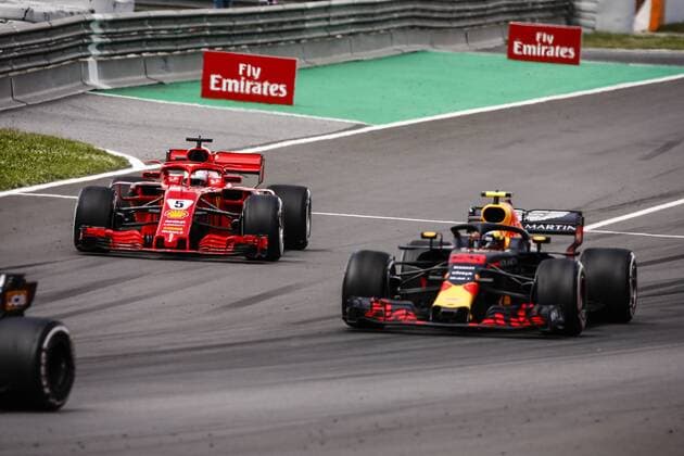 May 13, 2018 - Barcelona, Catalonia, Spain - 05 Sebastian Vettel from Germany with Scuderia Ferrari SF71H trying to overtake 33 Max Verstappen Max from Netherlands Aston Martin Red Bull Tag Heuer RB14 during the Spanish Formula One Grand Prix at Circuit de Catalunya on May 13, 2018 in Montmelo, Spain. Spanish F1 Grand Prix  - ZUMAn230 20180513_zaa_n230_876 Copyright: xXavierxBonillax