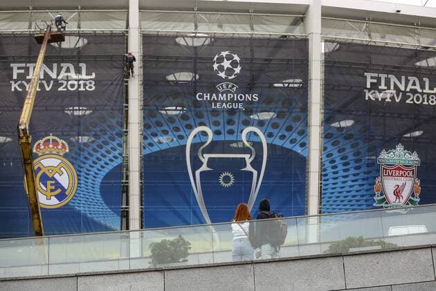 May 13, 2018 - Kiev, Ukraine - Workers cover NSC Olimpiyskiy with banners for the Champions League in Kyiv, Ukraine, May 13, 2018. Kyiv prepares to host UEFA Women s Champions League final between Wolfsburg and Lyon at Valeriy Lobanovskiy Dynamo Stadium on 24 May, 2018 and the UEFA Champions League final match between Real Madrid and Liverpool at NSC Olimpiyskiy Stadium on Saturday 26 May, 2018. Kyiv prepares for UEFA Champions League final  - ZUMAn230 20180513_zaa_n230_901 Copyright: xSergiixKharchenkox