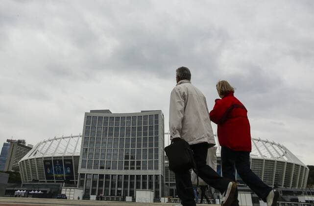 May 13, 2018 - Kiev, Ukraine - People walk near NSC Olimpiyskiy in Kyiv, Ukraine, May 13, 2018. Kyiv prepares to host UEFA Women s Champions League final between Wolfsburg and Lyon at Valeriy Lobanovskiy Dynamo Stadium on 24 May, 2018 and the UEFA Champions League final match between Real Madrid and Liverpool at NSC Olimpiyskiy Stadium on Saturday 26 May, 2018. Kyiv prepares for UEFA Champions League final  - ZUMAn230 20180513_zaa_n230_912 Copyright: xSergiixKharchenkox