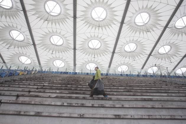 May 14, 2018 - Kiev, Ukraine - A worker cleans during preparation the NSC Olimpiyskiy football stadium, where will hold the final match of the UEFA Champions League Final 2018 , Kiev, Ukraine, 14 May, 2018 . Kiev is preparing for the 2018 UEFA Champions League Final which will be played at the NSC Olimpiyskiy Stadium on May 26. Champions League Final Match In Kiev  - ZUMAn230 20180514_zaa_n230_667 Copyright: xStrx