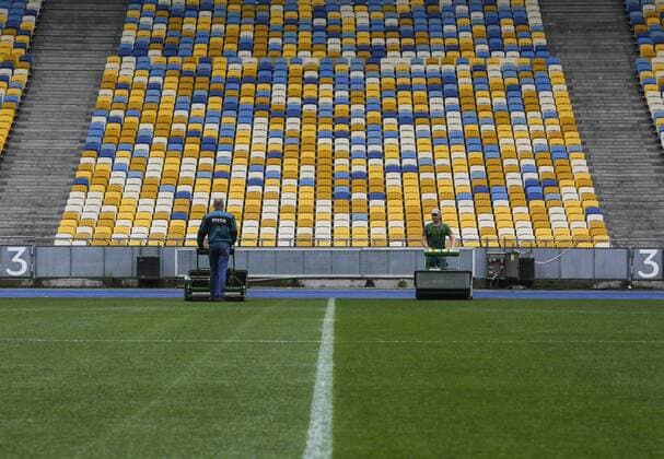 May 14, 2018 - Kiev, Ukraine - Workers prepare the NSC Olimpiyskiy stadiumfor the final match of the UEFA Champions League, Kyiv, Ukraine, May, 2018 . Kyiv for the 2018 UEFA Champions League final between Real Madrid and Liverpool has been putting the finishing touches to decorations and installing facilities with over 870,000 euros spent on infrastructure. Kyiv prepares NSC Olimpiyskiy for UCLF  - ZUMAn230 20180514_zaa_n230_680 Copyright: xSergiixKharchenkox