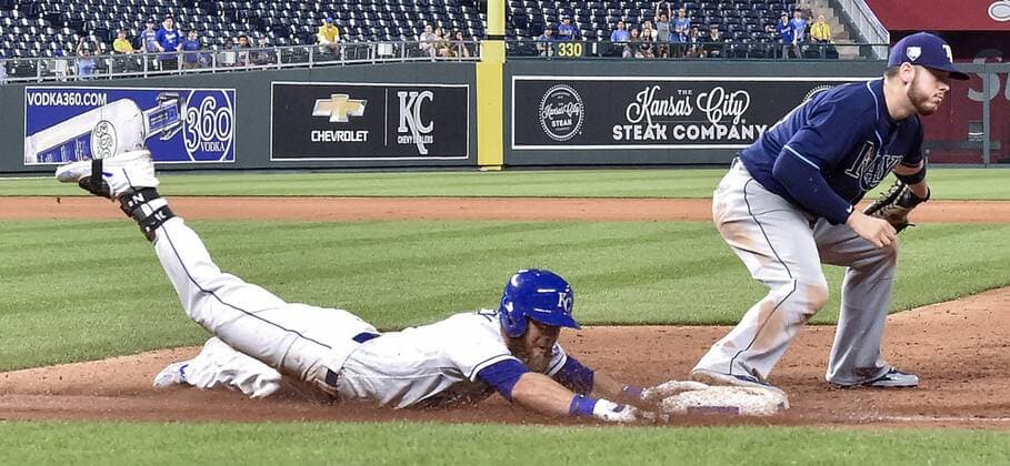 May 14, 2018 - Kansas City, MO, USA - Kansas City Royals Alex Gordon tried to beat the throw to Tampa Bay Rays first baseman C.J. Cron on the last play of the game during Monday s baseball game on May 14, 2018, at Kauffman Stadium in Kansas City, Mo. The Rays won, 2-1. Royals vs Rays - ZUMAm67_ 20180514_zaf_m67_045 Copyright: xJohnxSleezerx