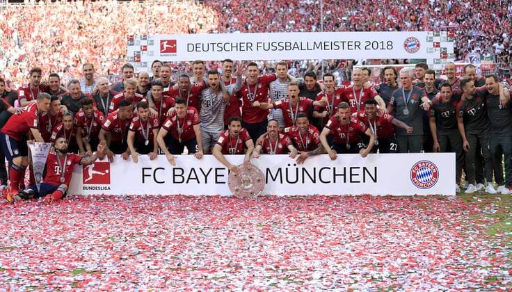 MUELLER Thomas Kapitaen Team FC Bayern Muenchen at the award ceremony with the champion team German Football Champion 2018 Football Bundesliga DFL season 2017 2018 match FC Bayern Munich VfB Stuttgart with championship celebration 2018 on 12 May 2015 in the Allianz Arena