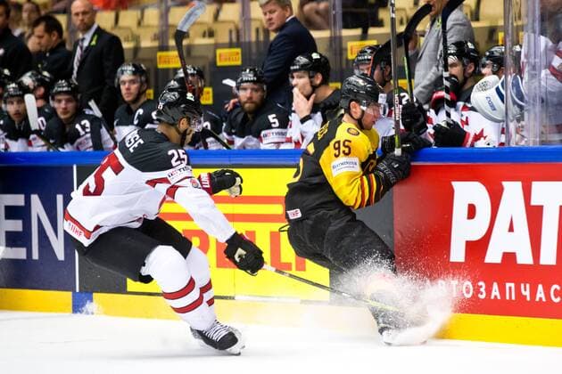 Bilder des Tages - SPORT Darnell Nurse 25, CAN, Frederik Tiffels 95, GER during their IIHF Ice hockey Eishockey World Championship WM Weltmeisterschaft 2018 CAN - GER match in Jyske Bank Boxen 15. May 2018 in Herning, Denmark.  Copyright: xTomixHänninenx tnp24SPO1511273986