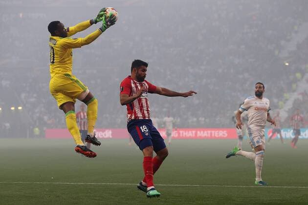 Olympique de Marseille v Atletico Madrid UEFA Europa League Fina Roberto Olabe of Atletico Madrid collects the ball safely ahead of Diego Costa of Atletico Madrid during the UEFA Europa League Final match at Stade de Lyons, Lyons Content Not Available For UK Newspapers Copyright: xPaulxChestertonx FIL-11807-0251