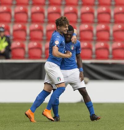 Emmanuel Gyabuaa of Italy scores the opening goal and celebrates with team mates during the UEFA European U17 U 17 Championship Semi Final match at the New York Stadium, Rotherham. Picture date 17th May 2018. Picture credit should read: James Wilson Sportimage EDITORIAL USE ONLY. No use with unauthorised audio, video, data, fixture lists, club league logos or live services. Online in-match use limited to 120 images, no video emulation. No use in betting, games or single club league player publications.