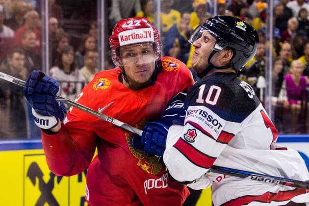 180517 Canada Brayden Schenn tackles Russias Nikita Zaitsev during the quarterfinals of the ice hockey World Cup between Russia and Canada on May 17, 2018 in Copenhagen  Copyright: PETTERxARVIDSON BB180517PA014