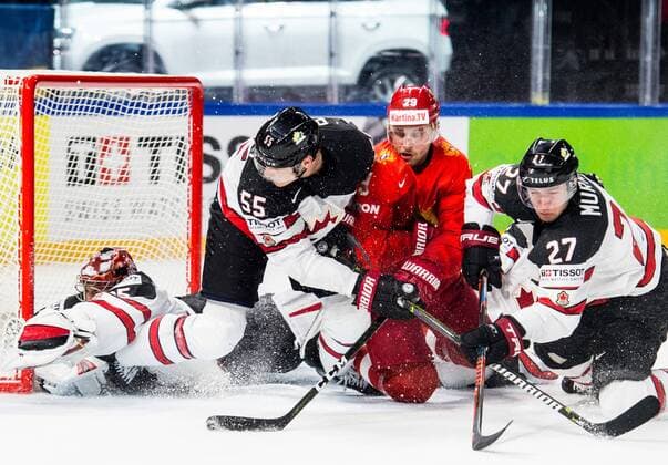 180517 Russias Ilya Kablukov in battle with Canadas Colton Parayko and Ryan Murray in front of malfunction Darcy Kuemper during the quarterfinals of the ice hockey World Cup between Russia and Canada on May 17, 2018 in Copenhagen  Copyright: PETTERxARVIDSON BB180517PA038