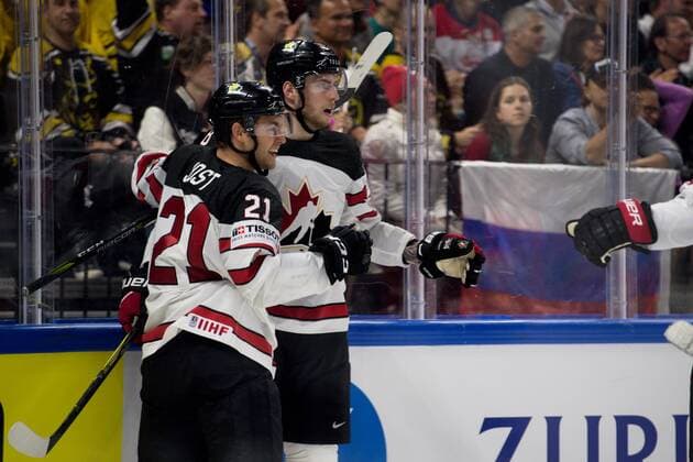 180517 Canadas Tyson Jost and Pierre Luc Dubois cheer for 3 4 of Dubois during the quarterfinals of the ice hockey World Cup between Russia and Canada on May 17, 2018 in Copenhagen  Copyright: PETTERxARVIDSON BB180517PA051