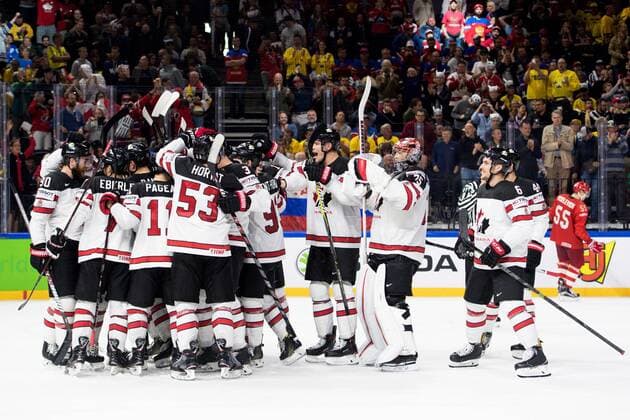 180517 Canadian players cheer for the quarterfinals of the ice hockey World Cup between Russia and Canada on May 17, 2018 in Copenhagen  Copyright: PETTERxARVIDSON BB180517PA060