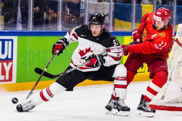 180517 Canadas Bo Horvat and Russias Sergei Andronov during the quarterfinals of the ice hockey World Cup between Russia and Canada on May 17, 2018 in Copenhagen  Copyright: PETTERxARVIDSON BB180517PA064