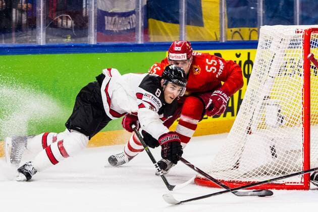 180517 Canadas Kyle Turris and Russias Bogdan Kiselevich during the quarterfinals of the ice hockey World Cup between Russia and Canada on May 17, 2018 in Copenhagen  Copyright: PETTERxARVIDSON BB180517PA079