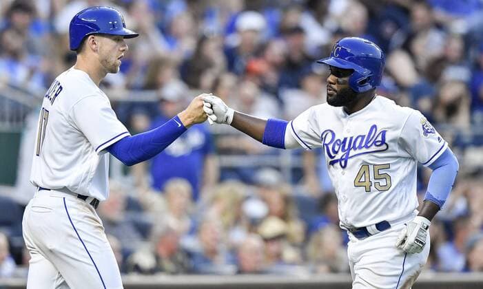 May 18, 2018 - Kansas City, MO, USA - Kansas City Royals Abraham Almonte is greeted by Hunter Dozier after Almonte scored on a fielding error by New York Yankees second baseman Gleyber Torres with the bases loaded on a ground ball hit by Jon Jay in the third inning during Friday s baseball game against the on May 18, 2018, at Kauffman Stadium in Kansas City, Mo. Royals vs Yankees - ZUMAm67_ 20180518_zaf_m67_030 Copyright: xJohnxSleezerx