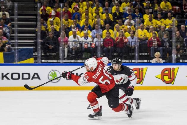 180519 Switzerland Tristan Scherwey and Canada Jordan Eberle during the semi-final of the ice hockey World Cup between Canada and Switzerland on May 19, 2018 in Copenhagen  Copyright: PETTERxARVIDSON BB180519PA126