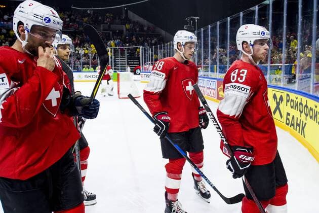 180519 Switzerland Gaetan Haas Lukas Frick and Joel Vermin leave the ice in the break during the semi-finals of the ice hockey World Cup between Canada and Switzerland on May 19, 2018 in Copenhagen  Copyright: LUDVIGxTHUNMAN BB180519LT114