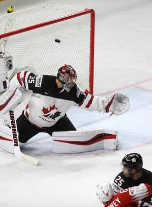 Ice hockey Eishockey - IIHF WC, CAN vs SUI COPENHAGEN,DENMARK,19.MAY.18 - ICE HOCKEY - IIHF World Championships, semifinal, Canada vs Switzerland. Image shows Darcy Kuemper, Darnell Nurse (CAN) and Tristan Scherwey (SUI). GEPAxpictures xAndreasxPranter