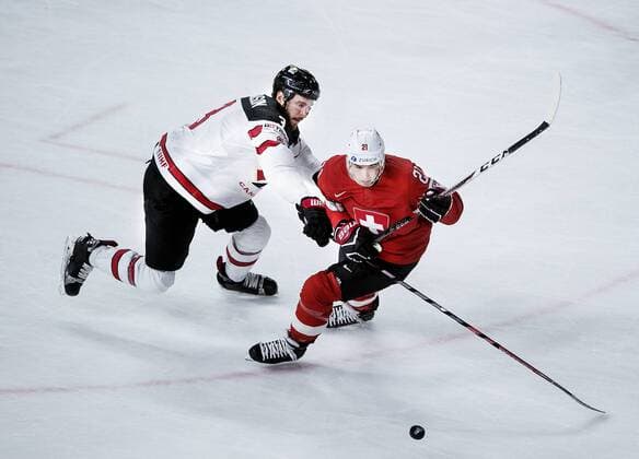 Kevin Fiala of Switzerland and Joel Edmonsson of Canada during the IIHF World Championship WM Weltmeisterschaft semi-final Ice hockey Eishockey match between Canada and Switzerland in Royal Arena in Copenhagen, Denmark, Saturday, May 19, 2018.. , Copenhagen Denmark  Copyright: Scanpix LiselottexSabroex COP102 spdk20180519-195834-L