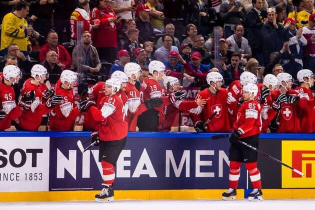 180519 Switzerland Kevin Fiala cheers with the base after his 1 2 draw during the semi-finals of the ice hockey World Cup between Canada and Switzerland on May 19, 2018 in Copenhagen  Copyright: PETTERxARVIDSON BB180519PA148