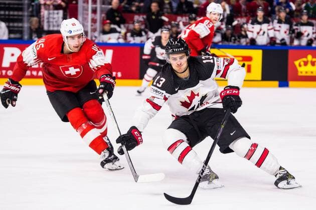 180519 Canadas Matt Barzal and Switzerland Michael Fora during the semi-final of the ice hockey World Cup between Canada and Switzerland on May 19, 2018 in Copenhagen  Copyright: PETTERxARVIDSON BB180519PA151