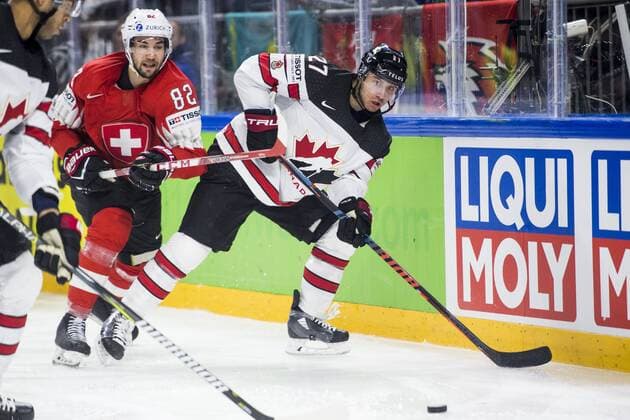 180519 Switzerland Simon Moser and Canadian Ryan Murray during the semi-finals of the ice hockey World Cup between Canada and Switzerland on May 19, 2018 in Copenhagen  Copyright: LUDVIGxTHUNMAN BB180519LT130