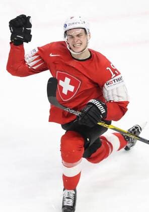 COPENHAGEN, DENMARK - MAY 19, 2018: Switzerlandâ€™s Gregory Hofmann celebrates scoring against Canada in their 2018 IIHF World Championship WM Weltmeisterschaft semi-final match at Royal Arena in Copenhagen. Anton Novoderezhkin TASS  TS08030D