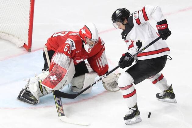 COPENHAGEN, DENMARK - MAY 19, 2018: Switzerlandâ€™s goaltender Leonardo Genoni (L) in their 2018 IIHF World Championship WM Weltmeisterschaft semi-final match against Canada at Royal Arena in Copenhagen. Anton Novoderezhkin TASS  TS080311