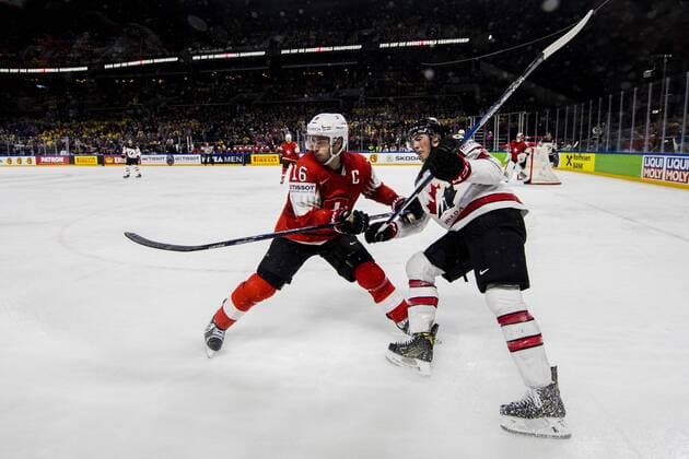 180519 Switzerland Raphael Diaz and Canadian Ryan Nugent Hopkins during the semi-finals of the ice hockey World Cup between Canada and Switzerland on May 19, 2018 in Copenhagen  Copyright: PETTERxARVIDSON BB180519PA164