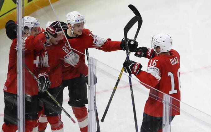 Ice hockey Eishockey - IIHF WC, CAN vs SUI COPENHAGEN,DENMARK,19.MAY.18 - ICE HOCKEY - IIHF World Championships, semifinal, Canada vs Switzerland. Image shows the rejoicing of Gaetan Haas, Sven Andrighetto, Gregory Hofmann and Raphael Diaz (SUI). GEPAxpictures xAndreasxPranter