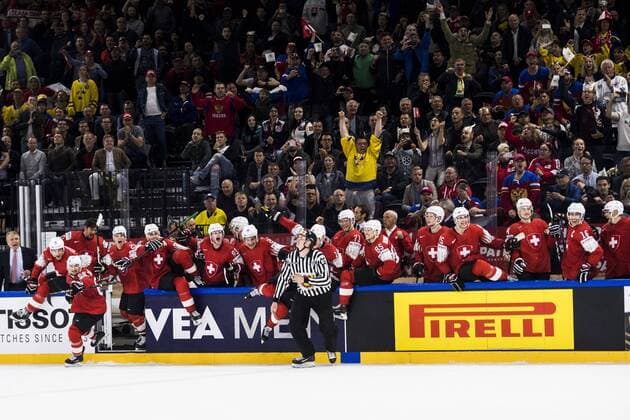 180519 Switzerland players are celebrating the semi-finals of the ice hockey World Cup between Canada and Switzerland on May 19, 2018 in Copenhagen  Copyright: PETTERxARVIDSON BB180519PA171