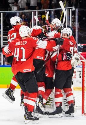 180519 Switzerland players are celebrating the semi-finals of the ice hockey World Cup between Canada and Switzerland on May 19, 2018 in Copenhagen  Copyright: PETTERxARVIDSON BB180519PA189