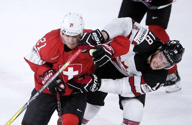Kevin Fiala of Switzerland and Pierre-Luc Dubois of Canada during the IIHF World Championship WM Weltmeisterschaft semi-final Ice hockey Eishockey match between Canada and Switzerland in Royal Arena in Copenhagen, Denmark, Saturday, May 19, 2018.. , Copenhagen Denmark  Copyright: Scanpix LiselottexSabroex COP102 spdk20180519-221626-L