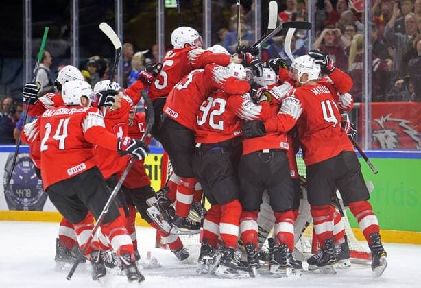 COPENHAGEN, DENMARK - MAY 19, 2018: Swiss players celebrate winning their 2018 IIHF World Championship WM Weltmeisterschaft semi-final match against Canada with a 2-3 score at Royal Arena in Copenhagen. Alexander Demianchuk TASS  TS08033B