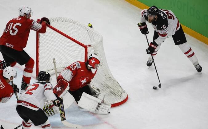 Ice hockey Eishockey - IIHF WC, CAN vs SUI COPENHAGEN,DENMARK,19.MAY.18 - ICE HOCKEY - IIHF World Championships, semifinal, Canada vs Switzerland. Image shows Michael Fora (SUI), Anthony Beauvillier (CAN), Leonardo Genoni (SUI) and Reilly o Ryan (CAN). GEPAxpictures xAndreasxPranter