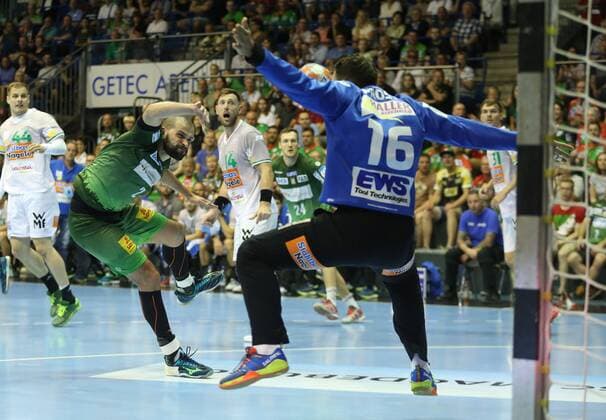 20 05 2018 xcsx Handball EHF Cup Final 4 Handball EHF Cup Final 4 Match 3 SC Magdeburg Fresh on Göppingen emspor v Zeljko Musa SC Magdeburg Primosz Cheers Fresh On Göppingen holds a litter Magdeburg