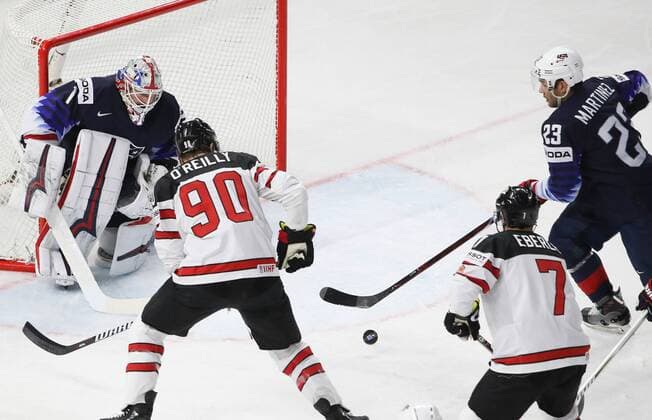 Ice hockey Eishockey - IIHF WC, USA vs CAN COPENHAGEN,DENMARK,20.MAY.18 - ICE HOCKEY - IIHF World Championships, match for third place, USA vs Canada. Image shows Keith Kinkaid (USA), Reilly o Ryan, Jordan Eberle (CAN) and Alec Martinez (USA). GEPAxpictures xAndreasxPranter