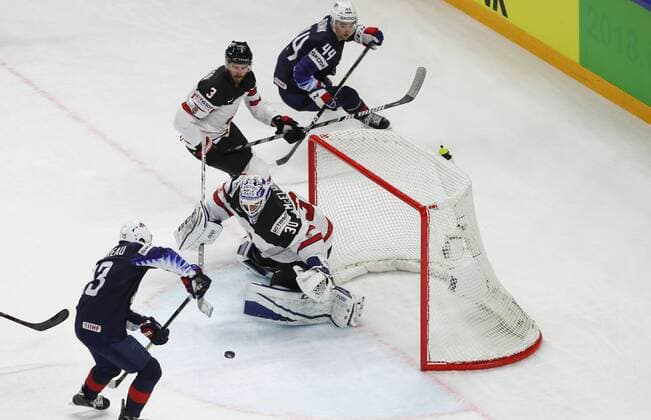 Ice hockey Eishockey - IIHF WC, USA vs CAN COPENHAGEN,DENMARK,20.MAY.18 - ICE HOCKEY - IIHF World Championships, match for third place, USA vs Canada. Image shows Johnny Gaudreau (USA), Curtis Mcelhinney, Joel Edmundson (CAN) and Neal Pionk (USA). GEPAxpictures xAndreasxPranter