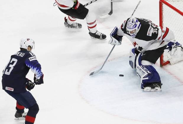 Ice hockey Eishockey - IIHF WC, USA vs CAN COPENHAGEN,DENMARK,20.MAY.18 - ICE HOCKEY - IIHF World Championships, match for third place, USA vs Canada. Image shows Johnny Gaudreau (USA) and Curtis Mcelhinney (CAN). GEPAxpictures xAndreasxPranter