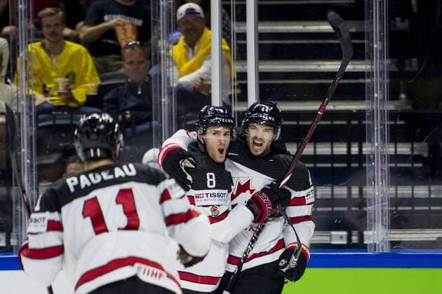 180520 Canadas Marc Edouard Vlasic is hugged by Kyle Turris after making 1 1 during the bronze match in the ice hockey World Cup between USA and Canada on May 20, 2018 in Copenhagen  Copyright: LUDVIGxTHUNMAN BB180520LT034